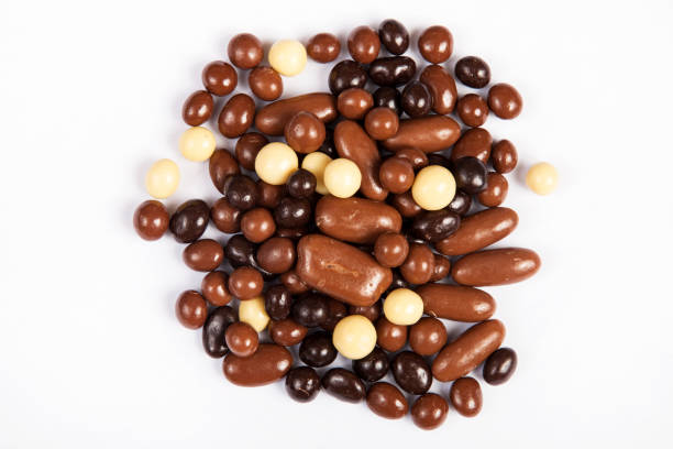 istock Milk chocolate pieces isolated on white background from top view 1141031427