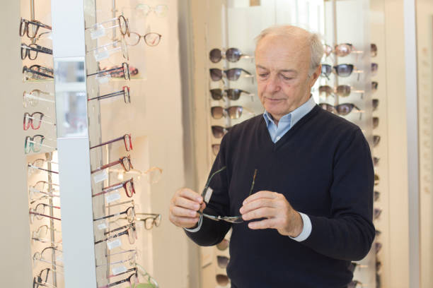 istock Senior man buying eyeglasses 1141036767