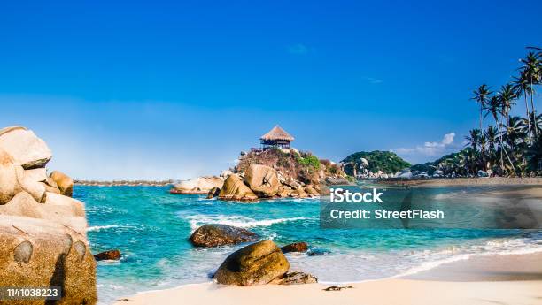 Beautiful Bay With White Sand Beach And Blue Water In Tayrona National Park In Colombia Stock Photo - Download Image Now
