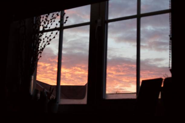istock Sunrise through a bedroom window 1141040829