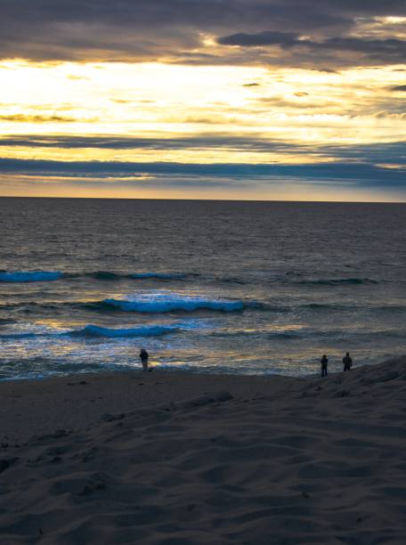 istock Golden hour sunset at the Marina state beach 1141041004