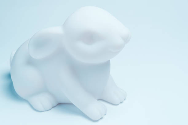 istock A statue of a white bunny on a uniform background 1141043076