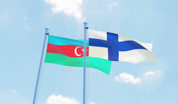 istock Finland and Azerbaijan, two flags waving against blue sky 1141043179