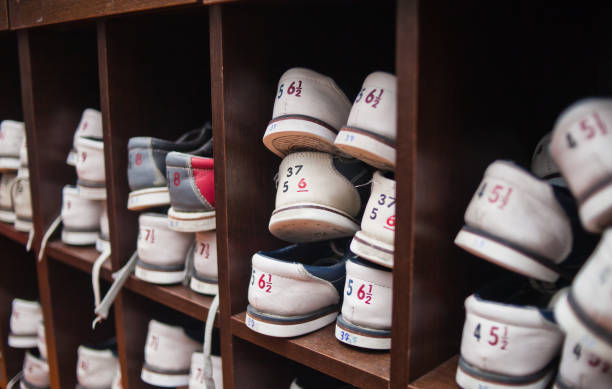 istock Many shelves with shoes for bowling. 1141044658