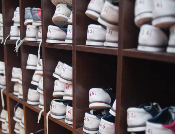 istock Many shelves with shoes for bowling. 1141044663