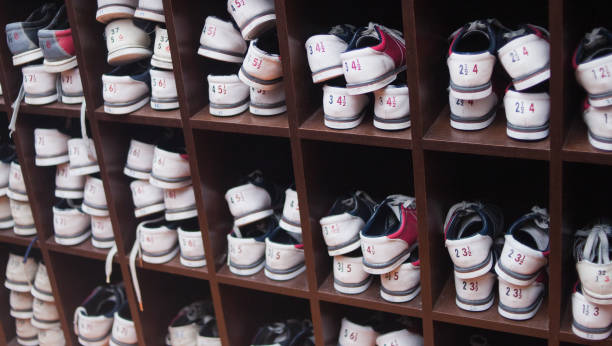 istock Many shelves with shoes for bowling. 1141044667