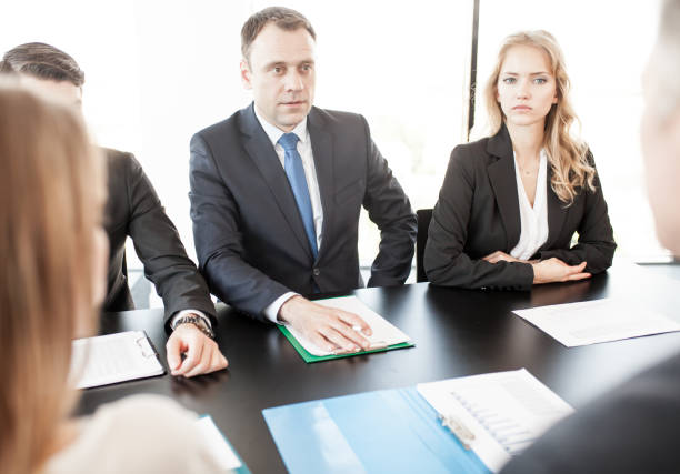 istock Business people discussing financial reports 1141044927