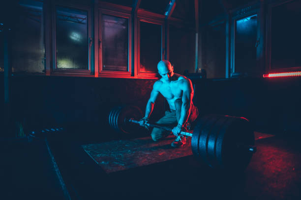 istock Bodybuilder dead lifting at the gym 1141046600
