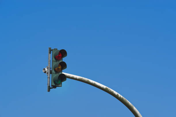istock Traffic light against clear blue sky 1141047454
