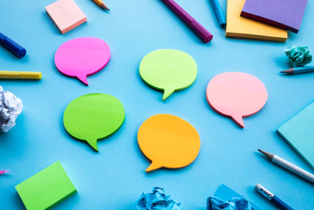 istock Business creativity note paper bubble on blue table background.brainstorming ideas 1141047651