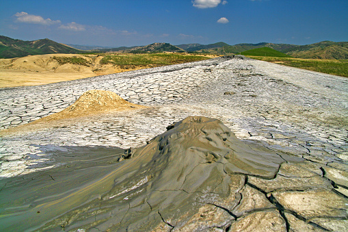 Mud volcanoes from Berca (Romania) are a spectacular feature  of volcano shapes structures , eruption of mud and natural gases