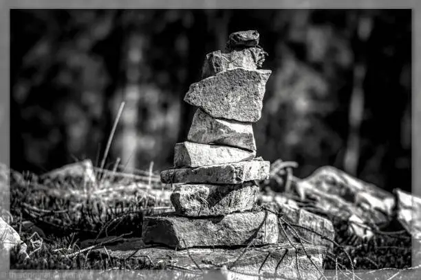 Black and white photo of a stone pile. Taken in the forest nearby. Wandersr's Waypoints.