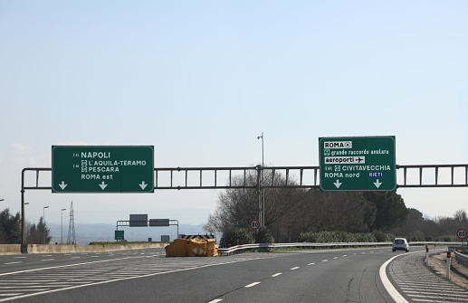 road junction in the italian highway and indications to ROME NAPLES and other italian place