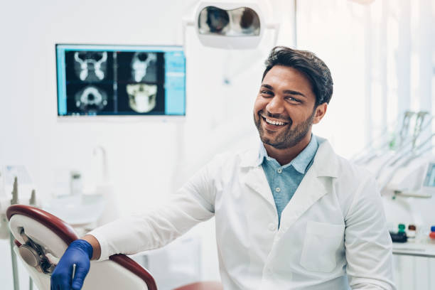 istock Welcoming dentist in his office 1141048859
