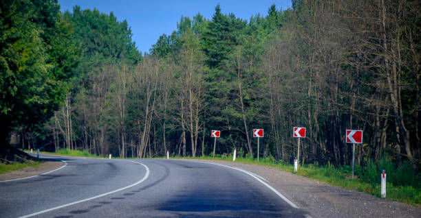 istock Summer asphalt road. Russian road. Road turn. 1141050189