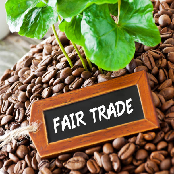 istock Coffee beans and fair trade label 1141051036