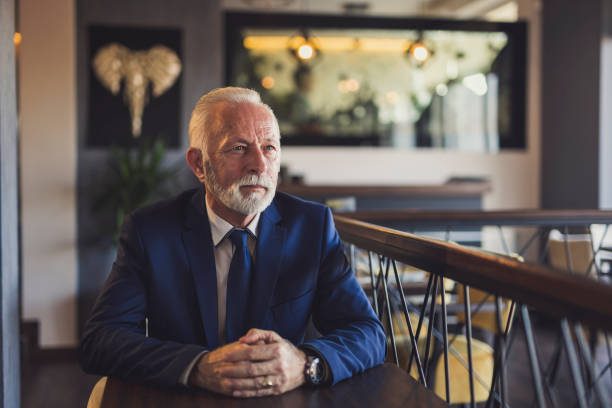 istock Pensive senior businessman in a restaurant 1141051055