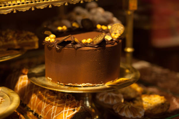 istock Beautiful chocolate cake on the bakery shop window 1141052235