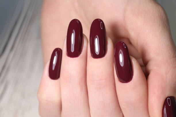 istock Beautiful woman's nails with beautiful christmas manicure 1141054210