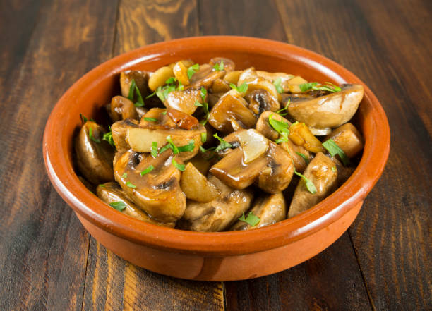 istock Mushrooms with garlic 1141054508
