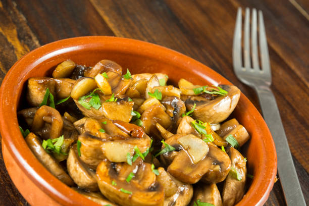 istock Mushrooms with garlic 1141055058
