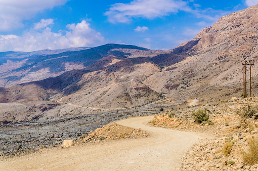 view of a road leading to the Jebel Akhdar in Hajar mountains in Oman.