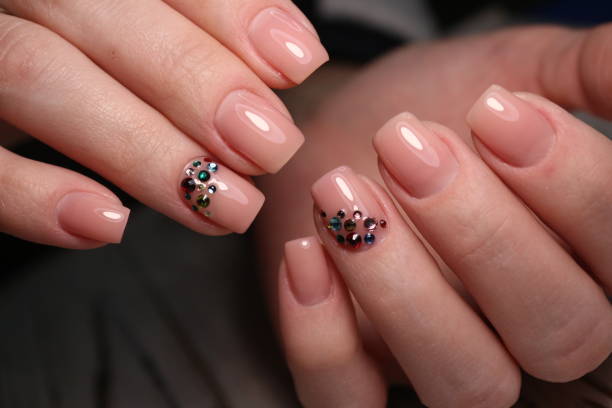 istock Beautiful groomed woman's hands 1141059159
