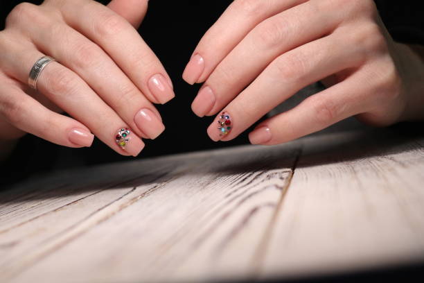 istock Beautiful groomed woman's hands 1141060625