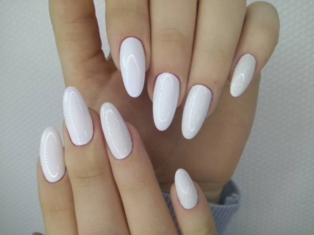 istock Beautiful woman's nails with beautiful christmas manicure 1141060872