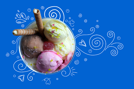 A cup of ice cream with rolled wafers. ice cream with blue background, and hand drawn elements.