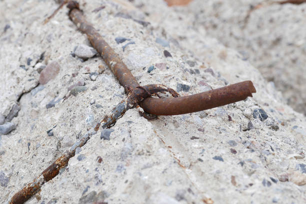 istock non-durable concrete, rotten concrete and rusty iron,rotten concrete and bricks, use of poor quality materials in construction, 1141061007