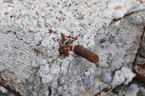 istock non-durable concrete, rotten concrete and rusty iron,rotten concrete and bricks, use of poor quality materials in construction, 1141061070