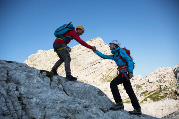istock Helping hand in the mountains 1141062156