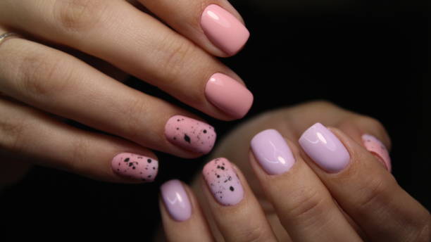 istock beautiful gel lacquer manicure on a textured trendy background 1141063421