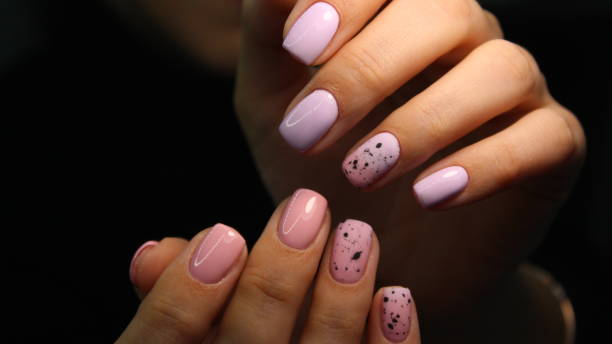 istock beautiful gel lacquer manicure on a textured trendy background 1141063487