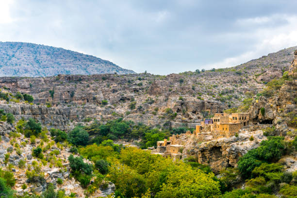 View of ruins of an abandoned village at the Wadi Bani Habib at the Jebel Akhdar mountain in Oman. View of ruins of an abandoned village at the Wadi Bani Habib at the Jebel Akhdar mountain in Oman. Oman stock pictures, royalty-free photos & images