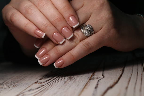 istock Amazing natural nails. Women's hands with clean manicure 1141066820