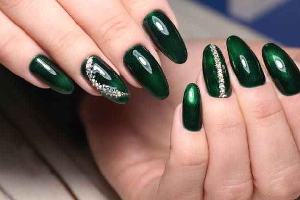 istock Beautiful woman's nails with beautiful christmas manicure 1141066886