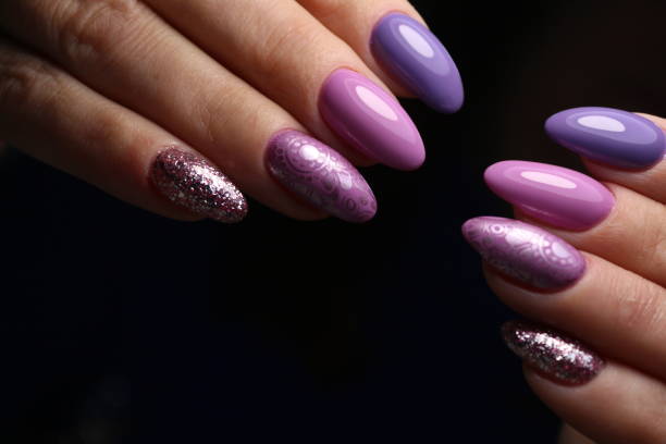 istock Beautiful woman's nails with beautiful christmas manicure 1141066898