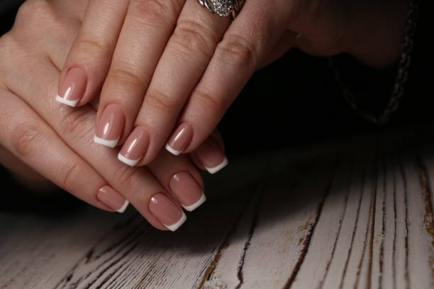 istock Beautiful woman's nails with beautiful christmas manicure 1141066987