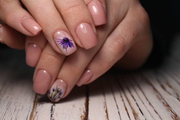 istock Beautiful groomed woman's hands 1141067071