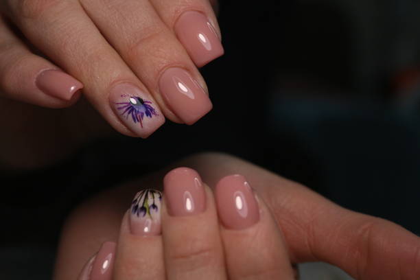 istock Amazing natural nails. Women's hands with clean manicure 1141067170
