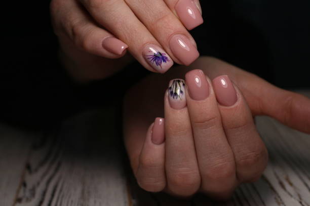 istock Beautiful groomed woman's hands 1141067746