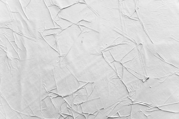 istock Crumpled creased posters grunge paper textures. 1141071724