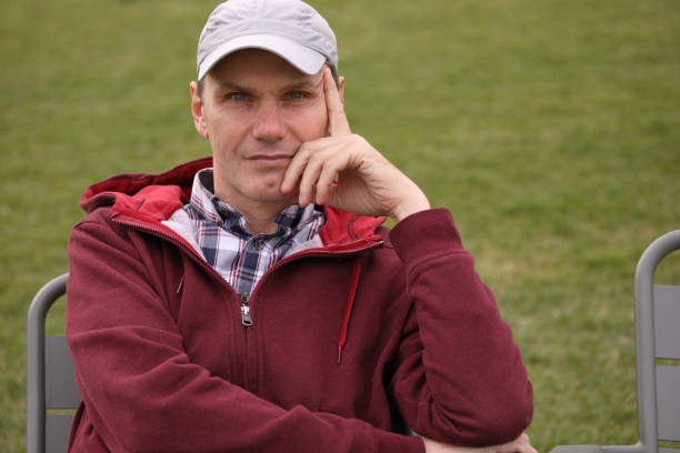 istock Man resting in a city park 1141072012