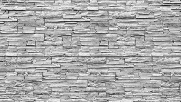 istock Abstract weathered texture stained old stucco light gray and aged paint white brick wall background in rural room, grungy rusty blocks of stonework technology color horizontal architecture wallpaper 1141076575
