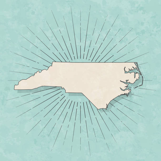 North Carolina map in retro vintage style - Old textured paper Map of North Carolina in a trendy vintage style. Beautiful retro illustration with old textured paper and light rays in the background (colors used: blue, green, beige and black for the outline). Vector Illustration (EPS10, well layered and grouped). Easy to edit, manipulate, resize or colorize. north carolina us state stock illustrations
