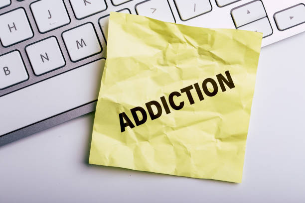 istock Addiction word write on the paper 1141083822
