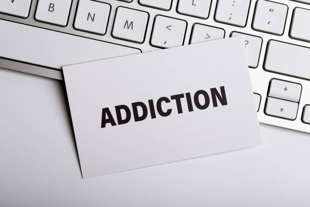 istock Addiction word write on the paper 1141083872