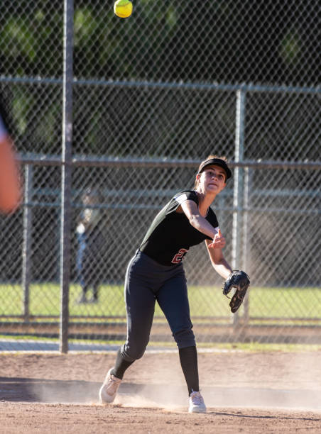 istock Fastpitch softball player focused on the game. 1141088616